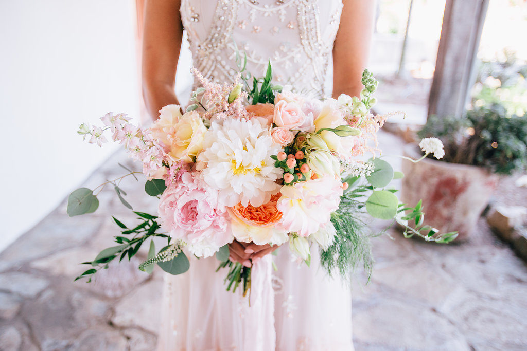bridal bouquet with pink, orange and white flowers