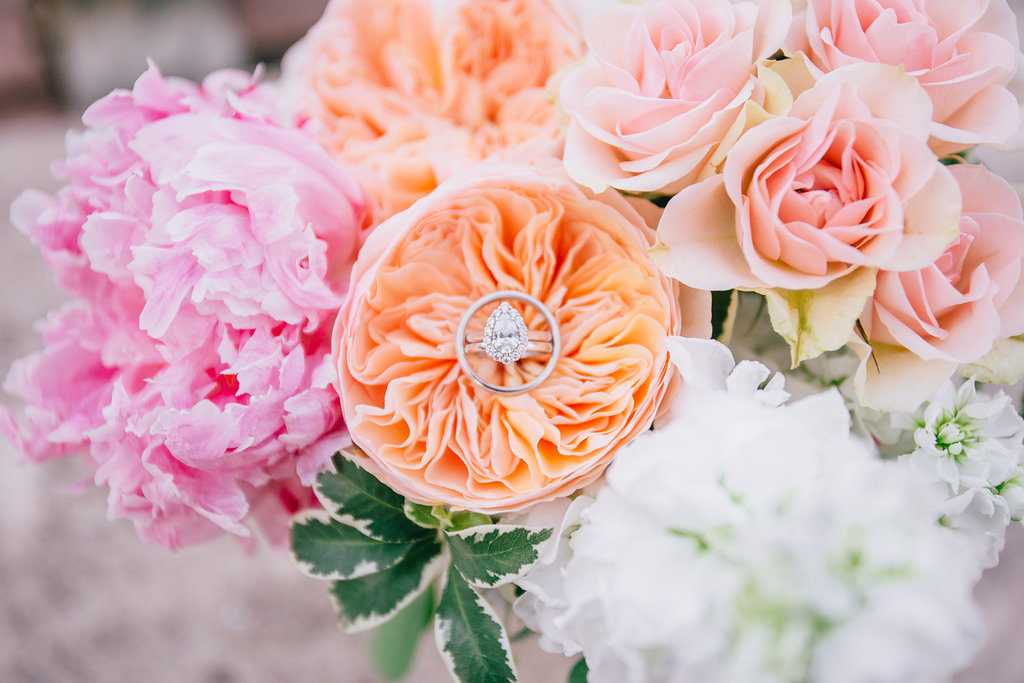 ring detail, bridal bouquet with pink, orange and white flowers