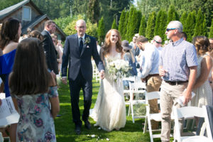Green Gates at Flowing Lake wedding ceremony bride