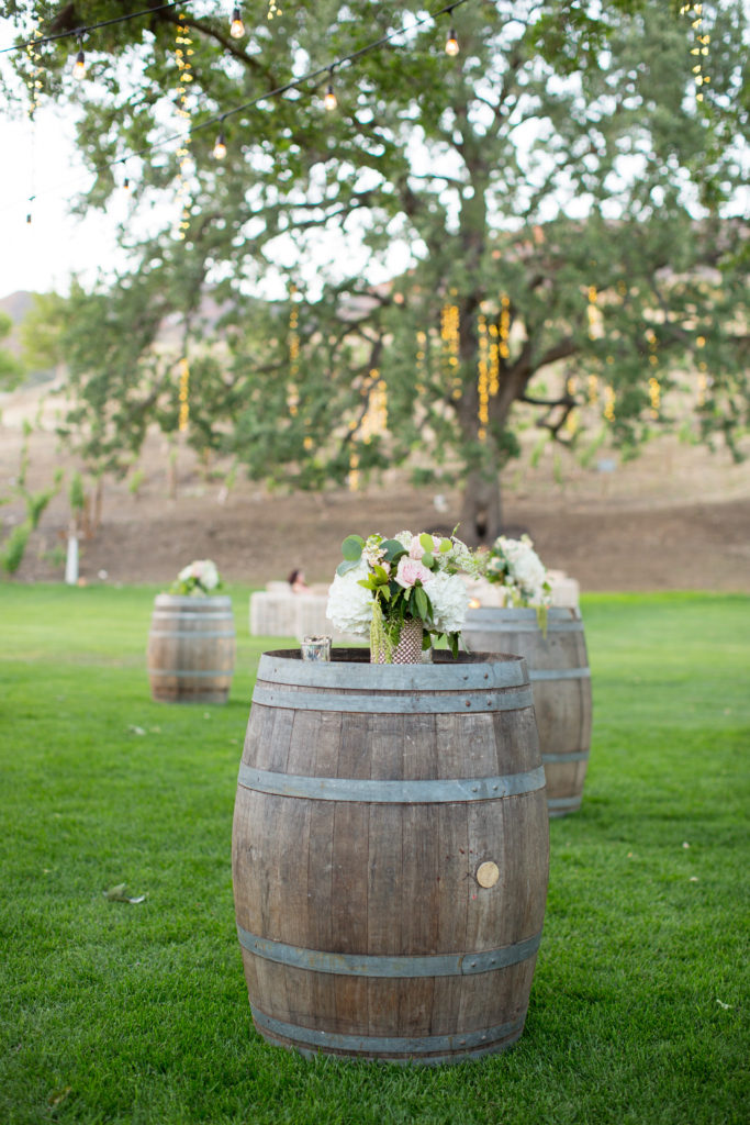 Triunfo Creek Vineyards wedding reception wine barrel decorations