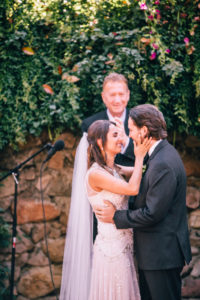 Rancho Adobe Wedding ceremony first kiss