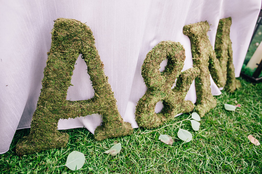 Rancho Buena Vista Adobe wedding reception sweetheart table, moss initials