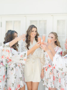 bridal party toast in robes