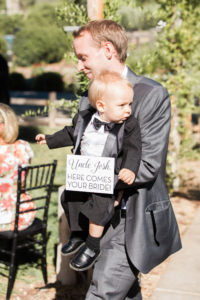 Sogno del fiore wedding ceremony in Santa Ynez winery, cute ring bearer sign