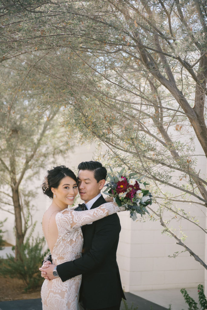 Ace Hotel wedding in Palm Springs bride and groom portrait shot, desert inspired bouquet
