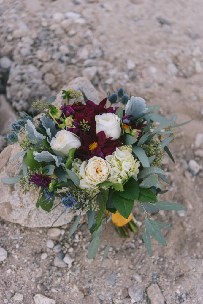 desert inspired bouquet with red, green and white