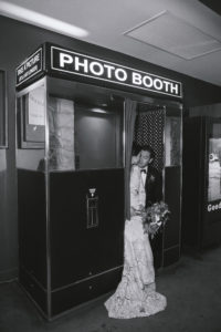 Ace Hotel wedding in Palm Springs wedding reception, bride and groom kiss in Photo Booth