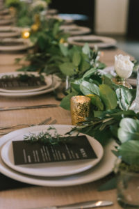 Ace Hotel wedding in Palm Springs wedding reception tablescape with greenery garlands, and black and white menus