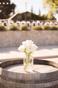 Sogno del fiore wedding reception in Santa Ynez winery, all white flower centerpieces