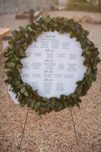 Sogno del fiore wedding reception in Santa Ynez winery, circle garland seating chart