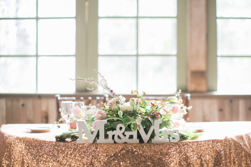 Calamigos Ranch Wedding Redwood Room reception, gold sweetheart table with mr and mrs wood sign