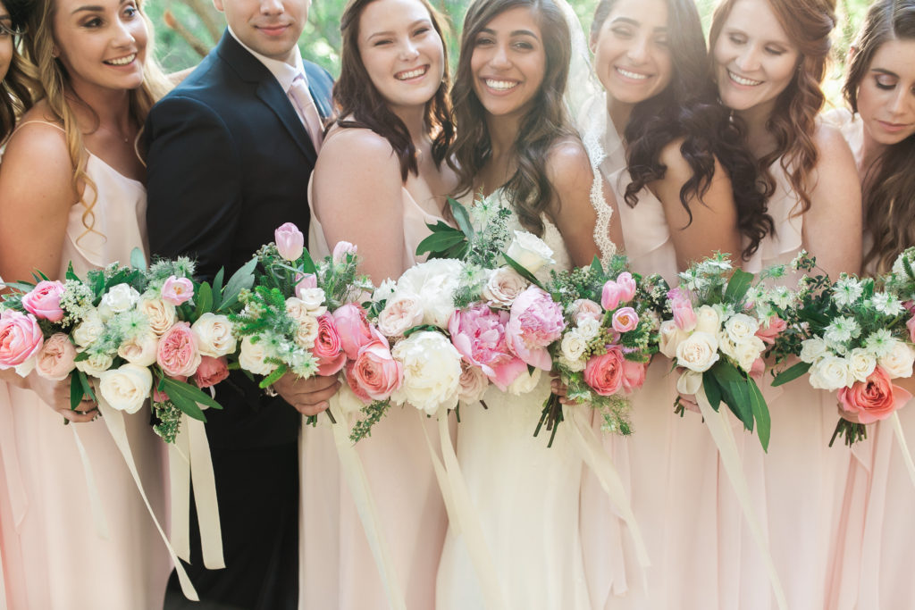 Calamigos Ranch wedding, co ed bridal party with blush bridesmaid dresses and pink, blush bouquets