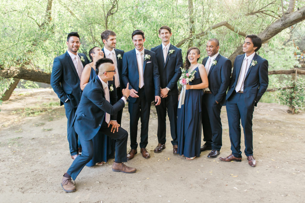 Calamigos Ranch wedding, co ed groom party with dark suits and navy dresses
