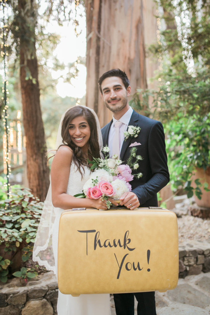 Calamigos Ranch wedding bride and groom thank you suitcase portrait