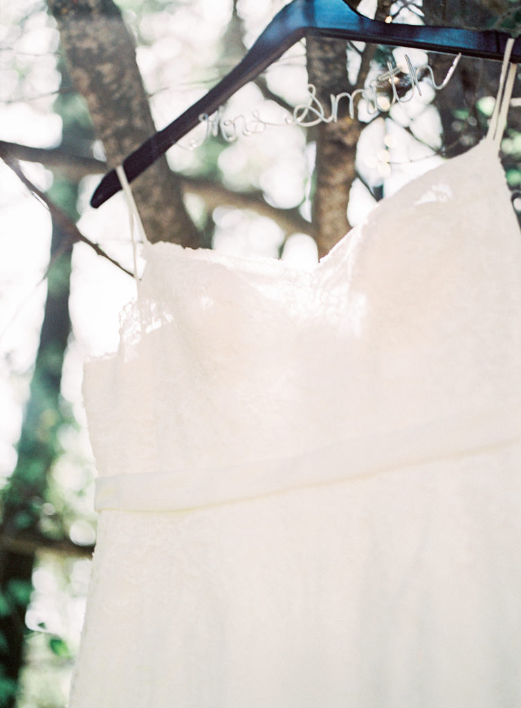 Calamigos ranch wedding, white wedding dress with bridal last name hanger