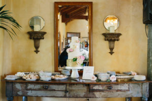travel themed wedding at Mountain Mermaid, multicultural wedding, dessert table with world decor on cake