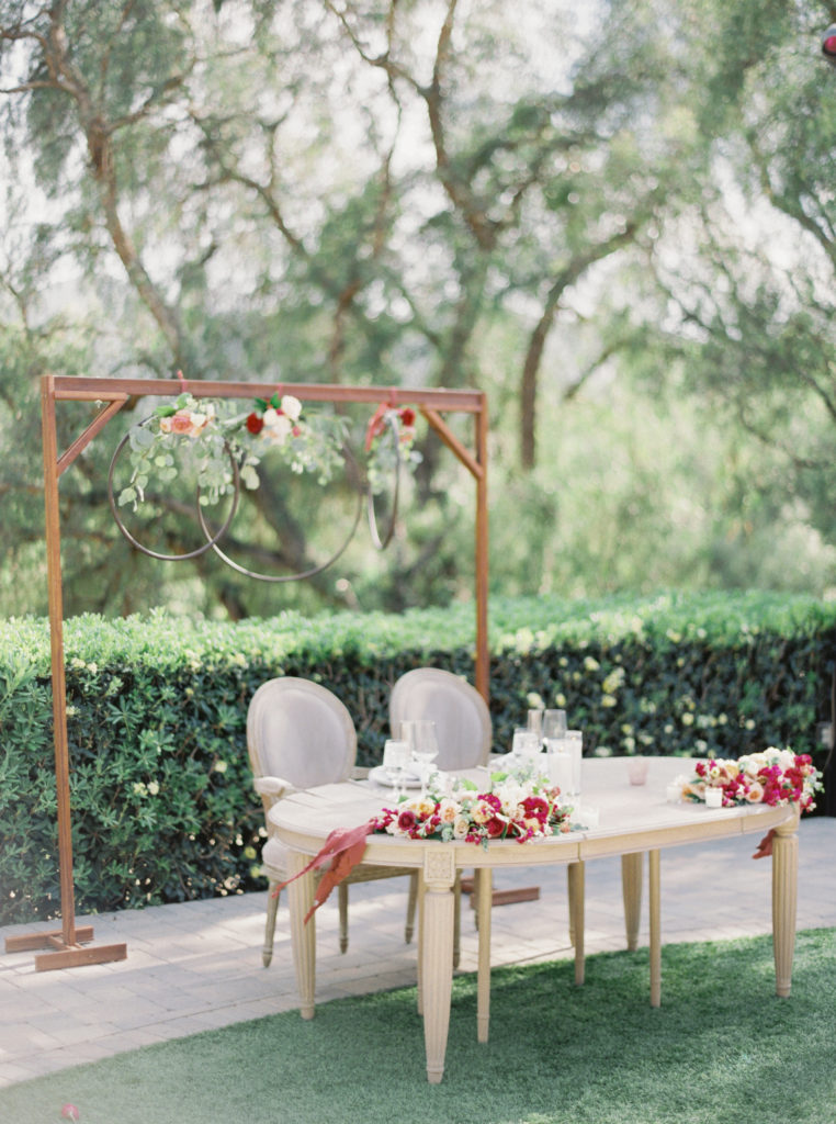 Maravilla Gardens Wedding, bride and groom portraits, sweetheart table with floral hoop backdrop