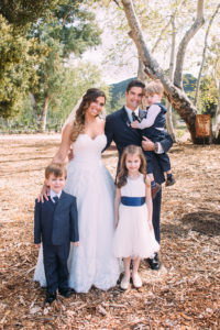 simple rustic wedding at Triunfo Creek Vineyards, bride and groom portraits with flower girl and ring bearer