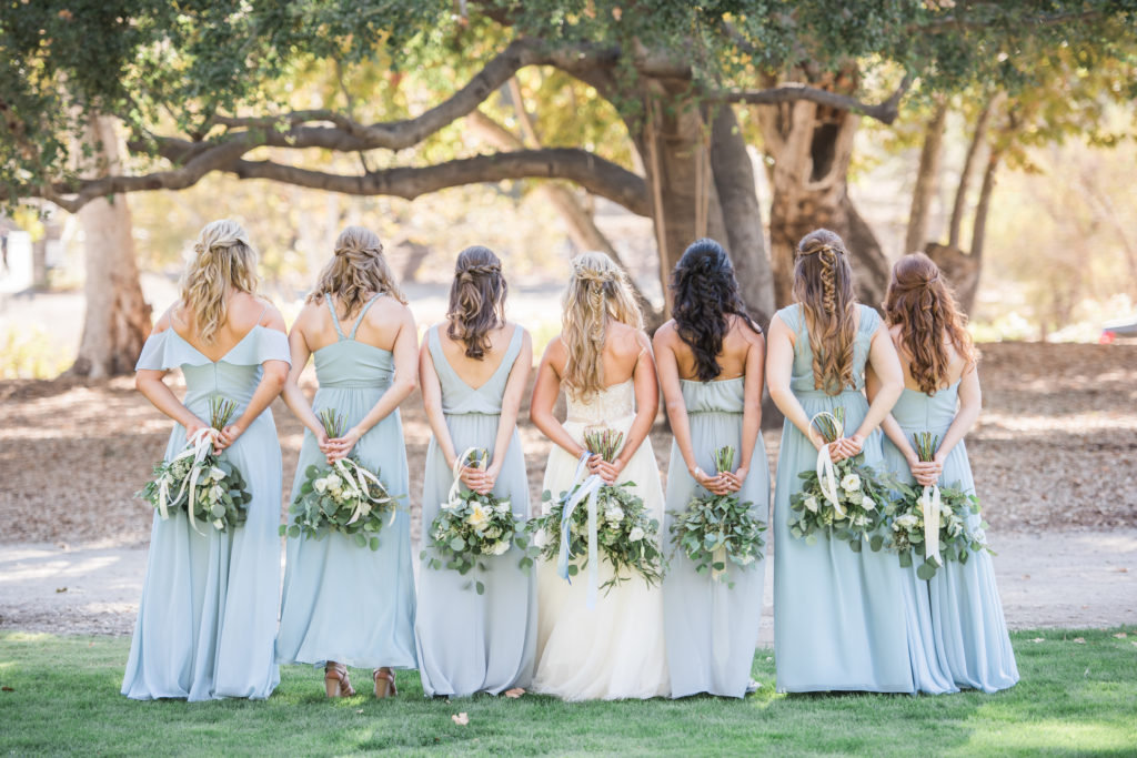 Elegant fall wedding at Triunfo Creek Vineyards, green and white bouquets, bridesmaids in blue dresses