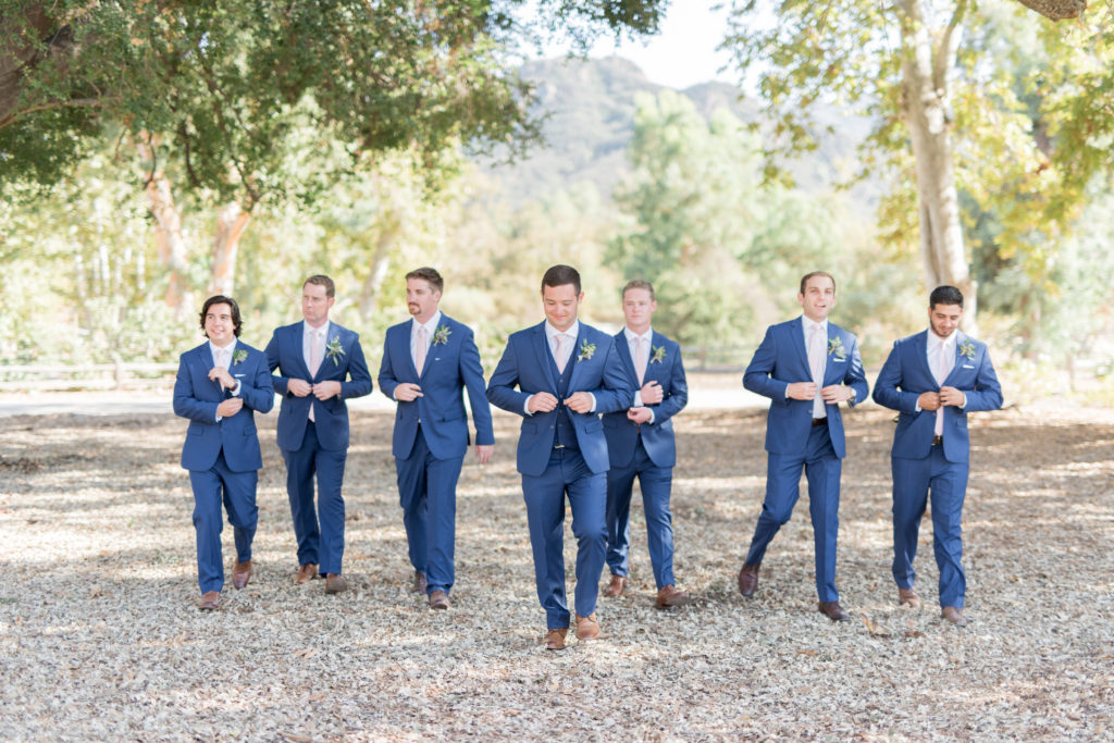 Elegant fall wedding at Triunfo Creek Vineyards, groom and groomsmen in blue suits