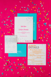 A colorful wedding at Unique Space LA, bright neon wedding invitation