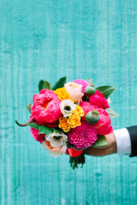 A colorful wedding at Unique Space LA, bride and groom, bride holding colorful bouquet