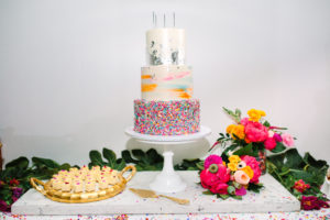 A colorful wedding at Unique Space LA, colorful wedding cake and dessert table