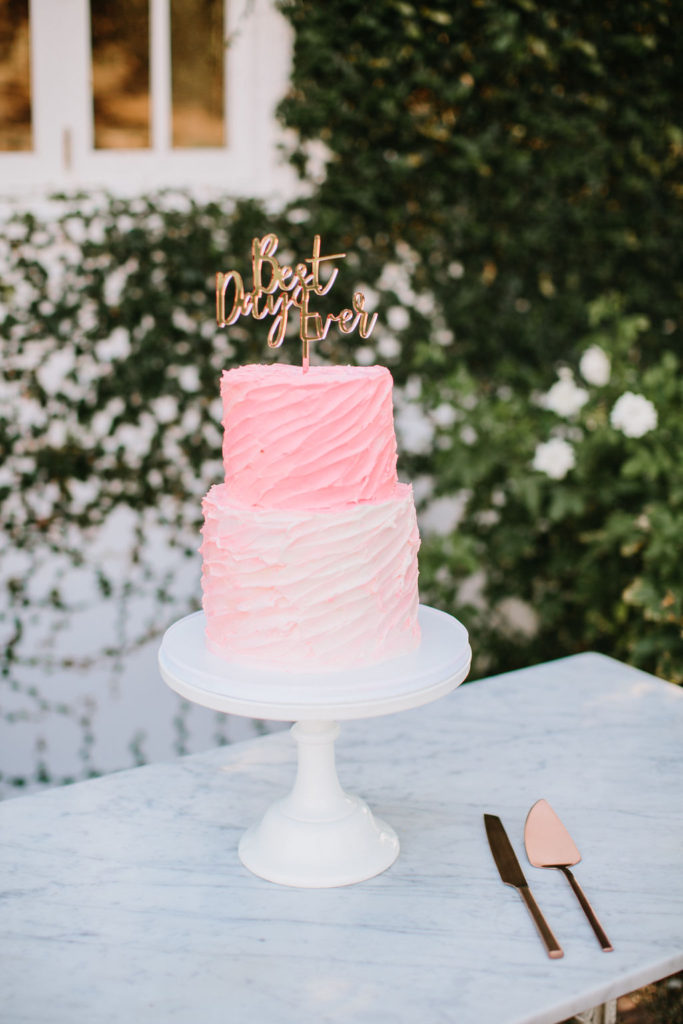 ombre bright pink wedding cake with custom "best day ever" cake topper at wedding reception at Triunfo Creek Vineyards