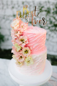 bright pink ombre wedding cake at wedding reception at Triunfo Creek Vineyards