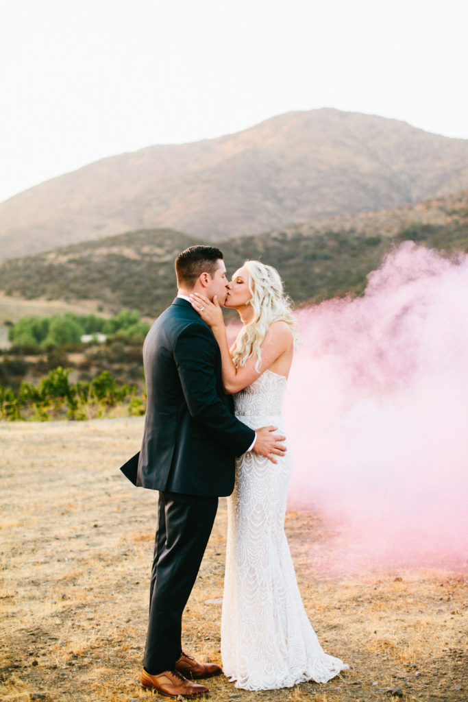 bride and groom sunset wedding portrait shot with smoke bombs at Triunfo Creek Vineyards