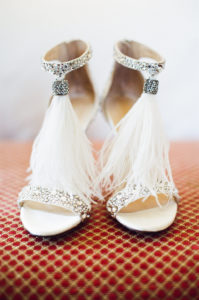 feathered bridal shoes for east coast meets west coast wedding at Calamigos Ranch