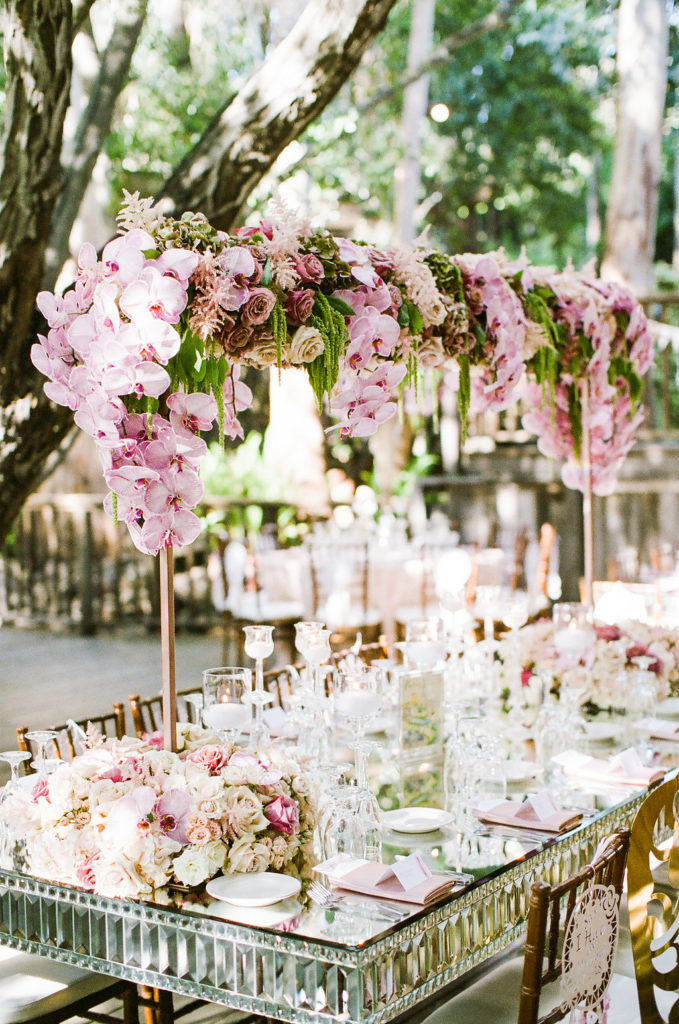 east coast meets west coast wedding reception at Calamigos Ranch with orchid floral centerpiece