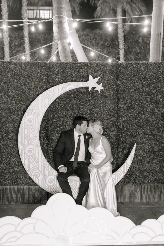 A glam and California infused wedding reception at Viceroy Santa Monica, bride and groom portrait with moon backdrop
