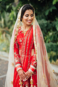 Stunning Indian Wedding in San Pedro, red bridal sari for sikh ceremony