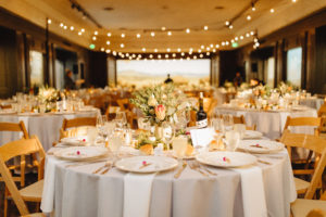 wedding reception with modern floral arrangements at contemporary wedding at the Natural History Museum in Los Angeles