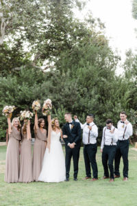 A chic rustic wedding at Calamigos Ranch, wedding party celebration shot
