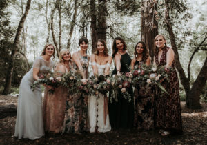 Summer camp themed wedding in Big Bear at Camp Wasegan, bride and bridesmaids in mixed bridesmaid dresses and bouquets