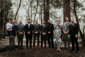 Summer camp themed wedding in Big Bear at Camp Wasegan, groom and groomsmen with mixed suits