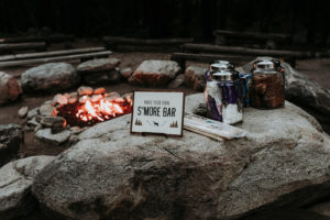 Summer camp themed wedding reception in Big Bear at Camp Wasegan, s'mores bar and fire pit