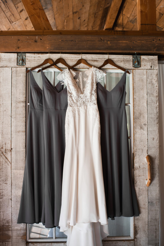 A simple and modern wedding at Triunfo Creek Vineyards, wedding dress with grey bridesmaid dresses