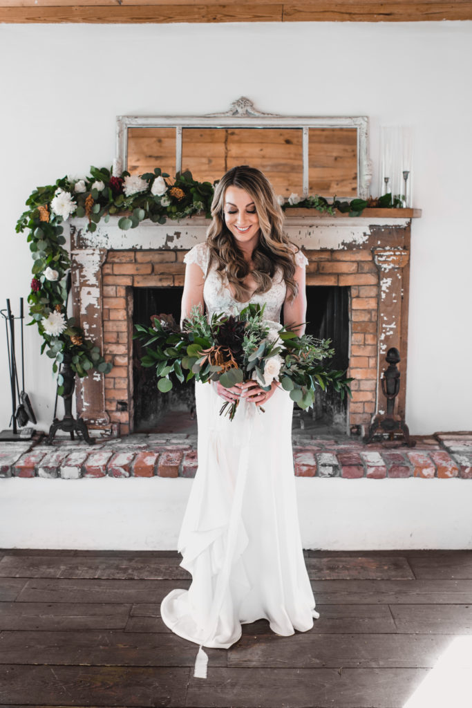 A simple and modern wedding at Triunfo Creek Vineyards, bride with bouquet