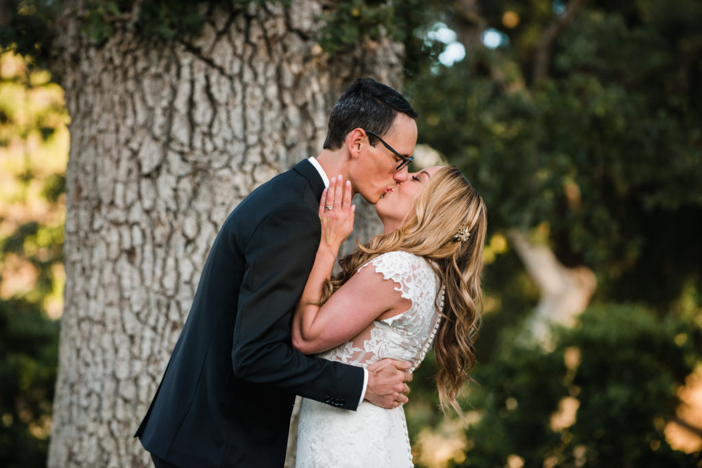 A simple and modern wedding ceremony at Triunfo Creek Vineyards, first kiss