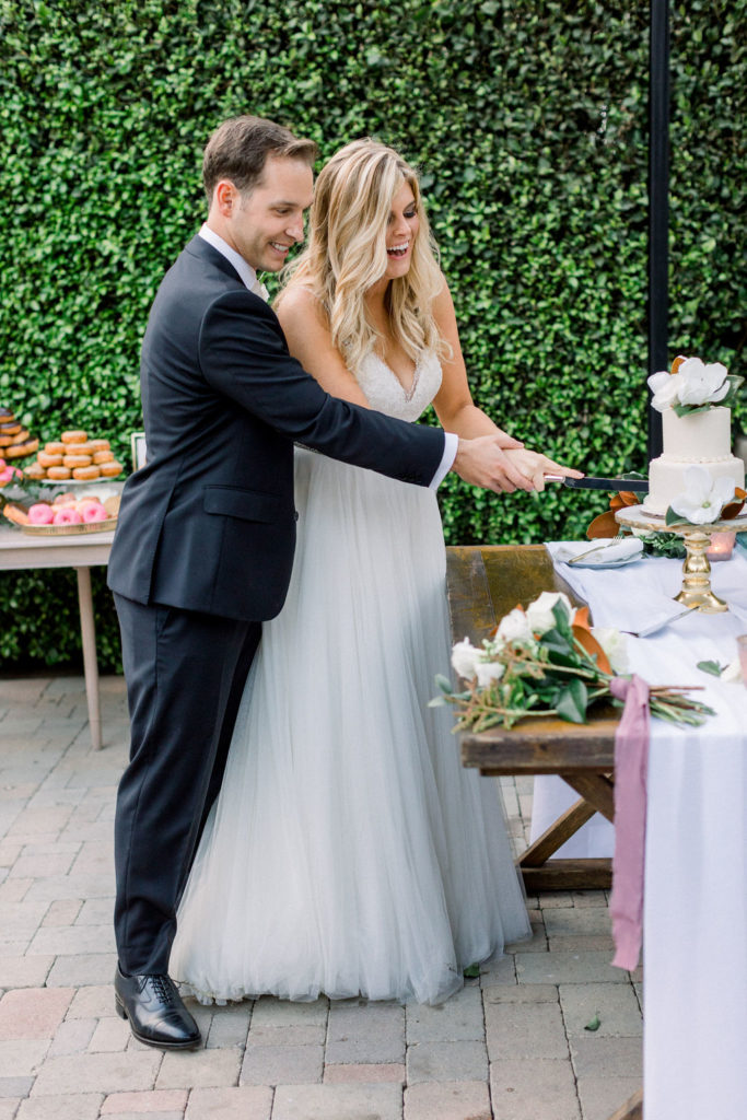 A Romantic Fall Wedding reception at Maravilla Gardens, cake cutting