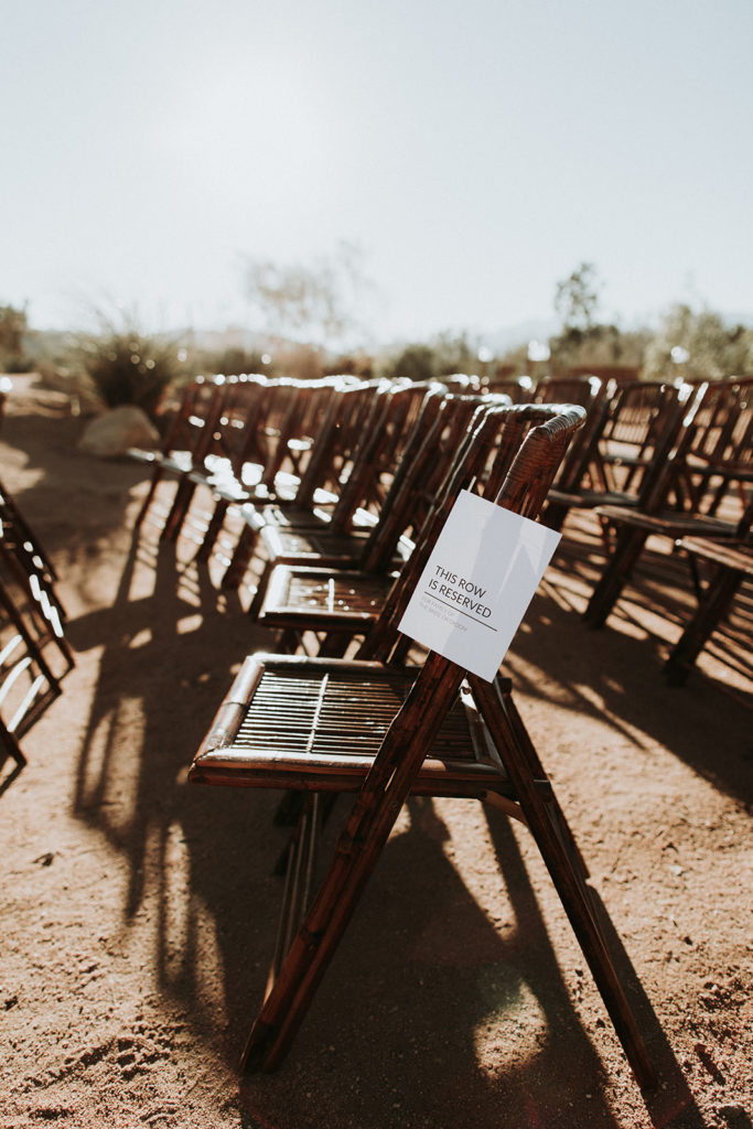 A Joshua Tree wedding at Tumbleweed Sanctuary, modern reserved sign for ceremony 