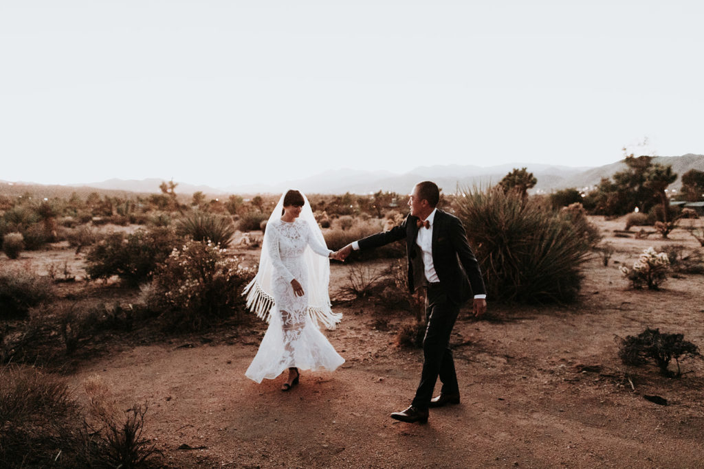 A Joshua Tree wedding at Tumbleweed Sanctuary, bride and groom sunset portrait shots in the desert