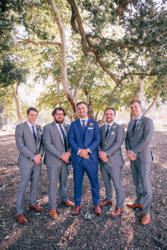 Fall Wedding at Triunfo Creek Vineyards, groom with groomsmen in blue and grey suits