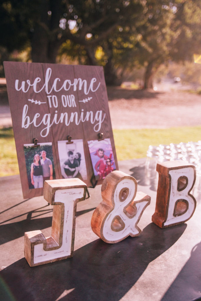 Fall Wedding at Triunfo Creek Vineyards, rustic welcome table