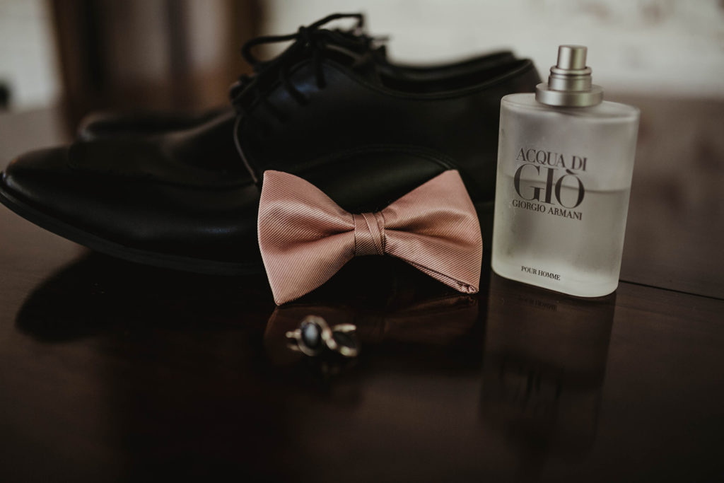 A romantic wedding at Ebell Long Beach, groom details, pink bowtie