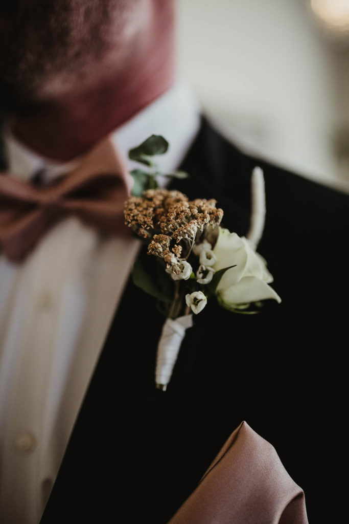 A romantic wedding at Ebell Long Beach, small groomsmen boutonniere