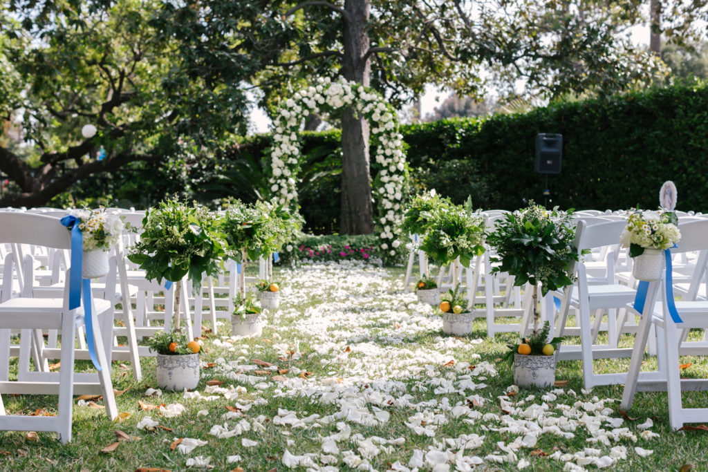 An Al Fresco Wedding ceremony at the Valley Hunt club, green and white florals 